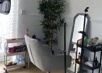Cozy styling nook at Kovalocs, London, England, GB with lush plants and modern decor.