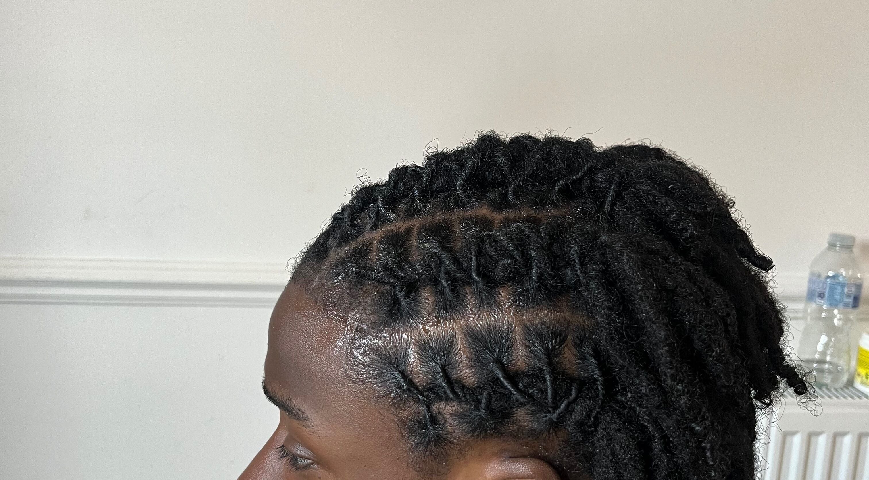 Intricate dreadlock hairstyle at Kovalocs, London, England, GB, showcasing expert hair styling.