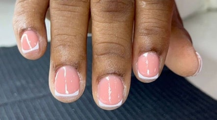 Elegant French manicure at Classy Rose Nail Studio in Sxm, SXM, SX. Perfectly polished nails.