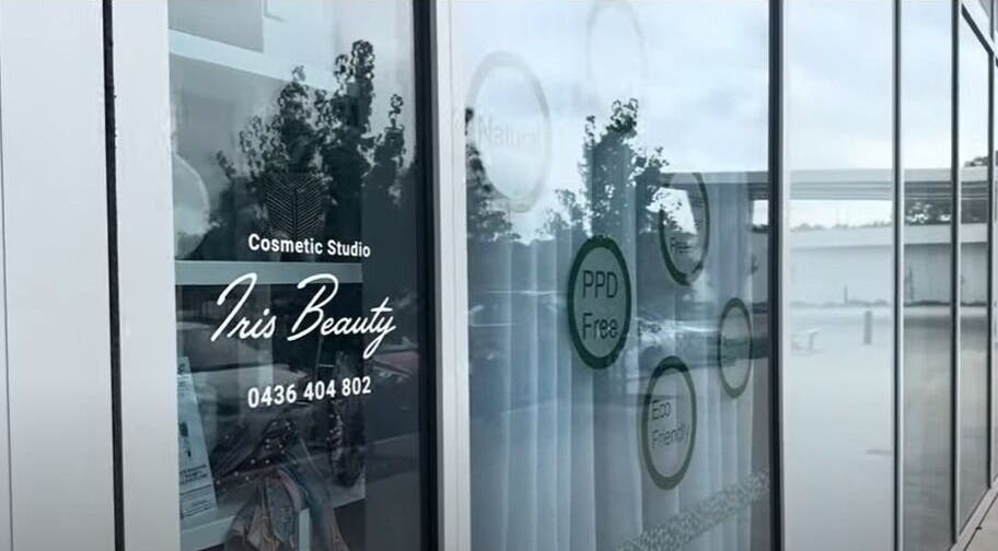 Exterior glass of Iris Beauty Studio Salon in Mirrabooka, Western Australia, AU showcasing natural light.