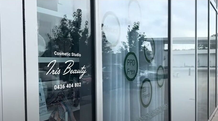 Exterior glass of Iris Beauty Studio Salon in Mirrabooka, Western Australia, AU showcasing natural light.