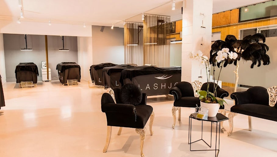 Elegant LashJoy salon in Fortitude Valley, Queensland, AU with stylish chairs and serene beauty beds.