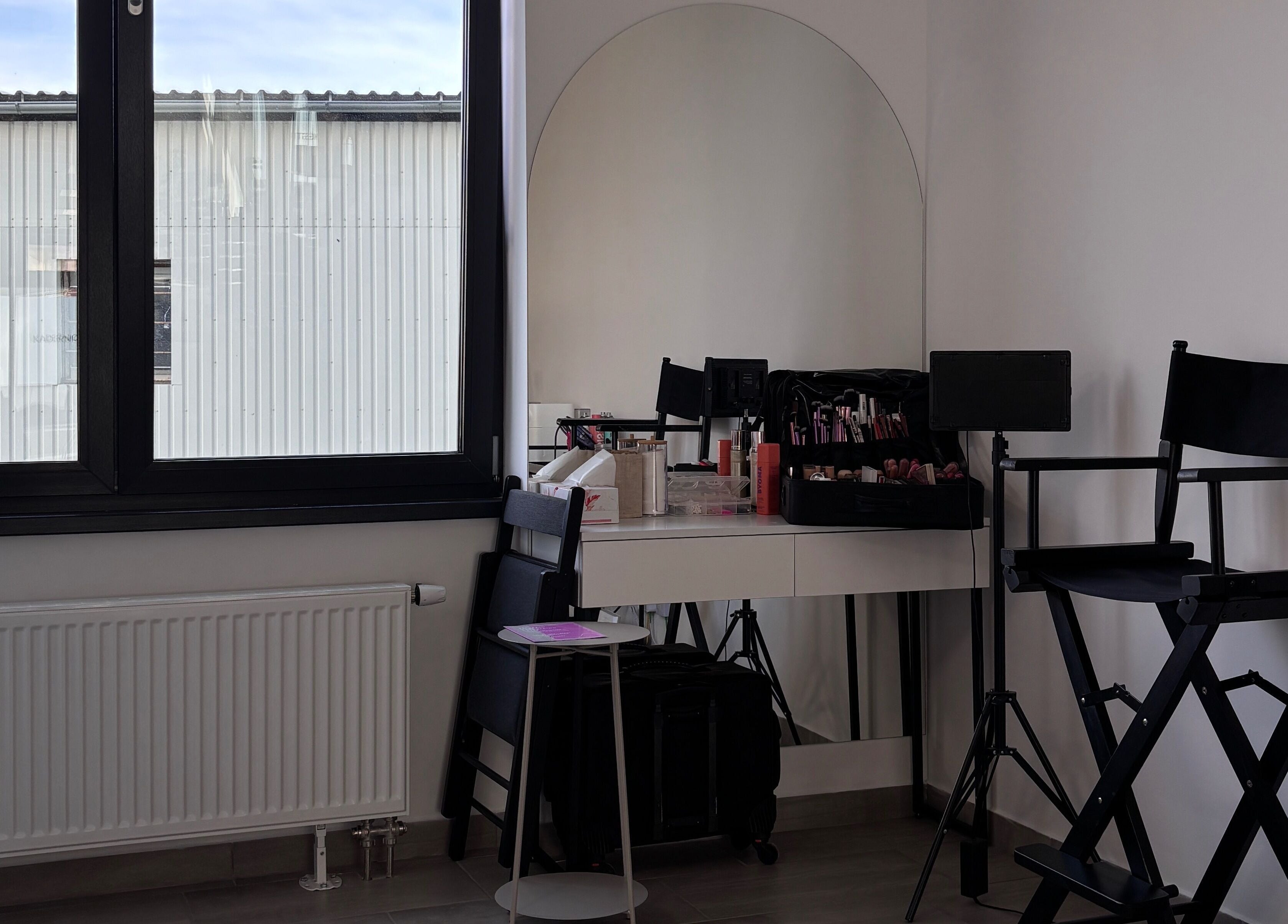 Modern make-up studio at Studio.bbx, Plzeňský Kraj, with stylish seating and ample natural light.