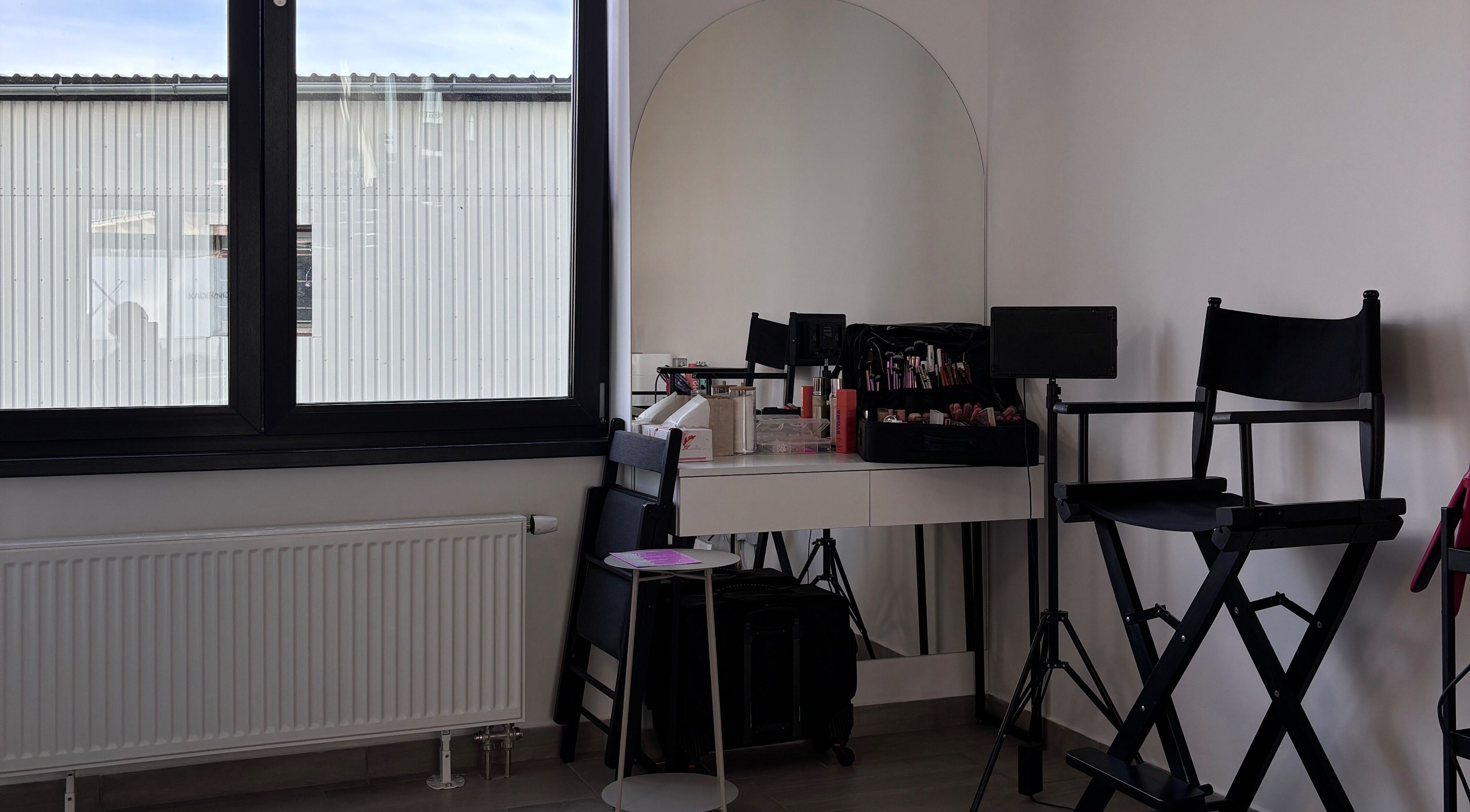 Modern make-up studio at Studio.bbx, Plzeňský Kraj, with stylish seating and ample natural light.