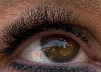 Close-up of eyelash extensions at Everspoilt in Tyger Valley, Gauteng, ZA, showcasing skilled application.