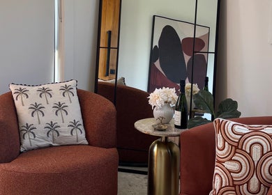 Elegant seating area at Palm Laser, Holsworthy, New South Wales, AU with stylish decor and comfortable chairs.