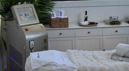 Palm Laser clinic interior with laser machine and cozy decor, Holsworthy, New South Wales, AU.