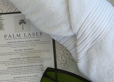 Palm Laser brochure with soft towel in Holsworthy, New South Wales, AU, offering premium hair removal services.