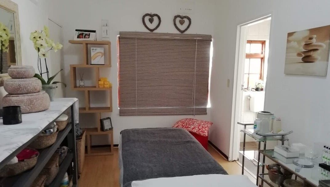 Relaxing spa room at Glow Connect Aesthetics in Cape Town, Western Cape, ZA, showcasing modern decor and soothing ambiance.