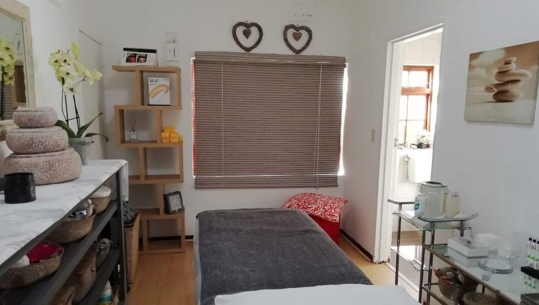 Relaxing spa room at Glow Connect Aesthetics in Cape Town, Western Cape, ZA, showcasing modern decor and soothing ambiance.