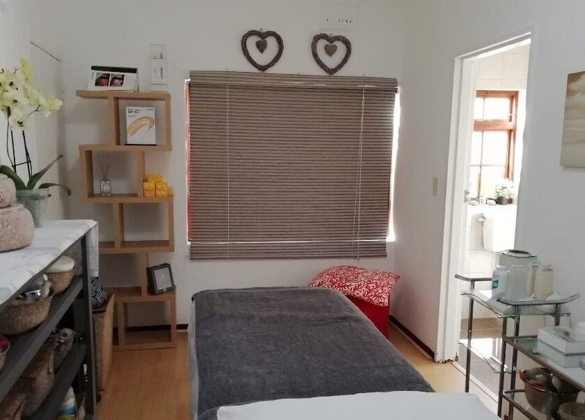 Relaxing spa room at Glow Connect Aesthetics in Cape Town, Western Cape, ZA, showcasing modern decor and soothing ambiance.