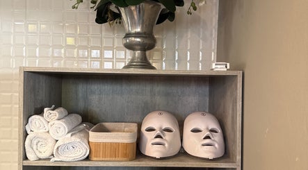 Towels and masks on a shelf at Royal Tree Beauty, Potchefstroom, North West, ZA, offering a calming vibe.