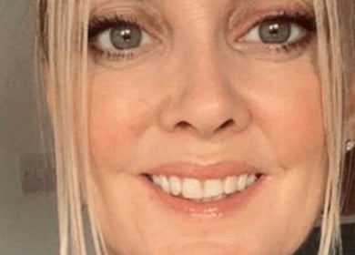 Close-up of a smiling face at Serenity Massage by KC, Cuffley, England, GB, showcasing relaxation.