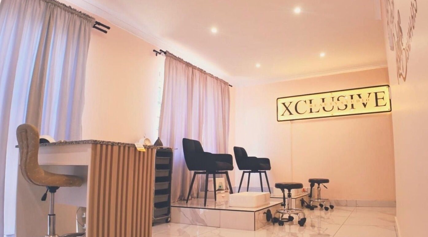 Xclusive Beauty Studio pedicure area with elegant seating, located in Durban North, Kwazulu-Natal, ZA.