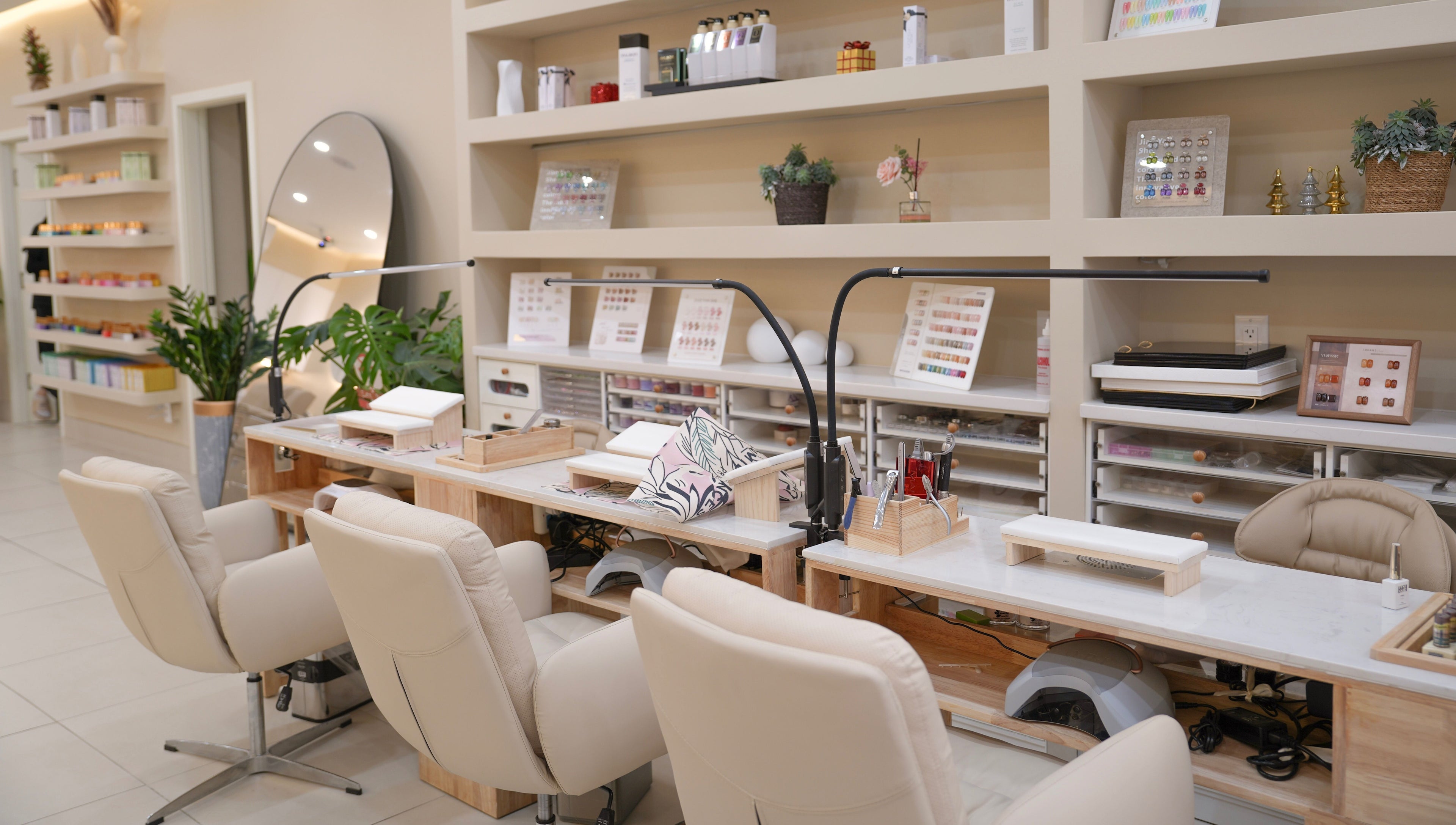 Elegant nail station at H&K Health Beauty in New York, New York, US, showcasing modern design and comfort.
