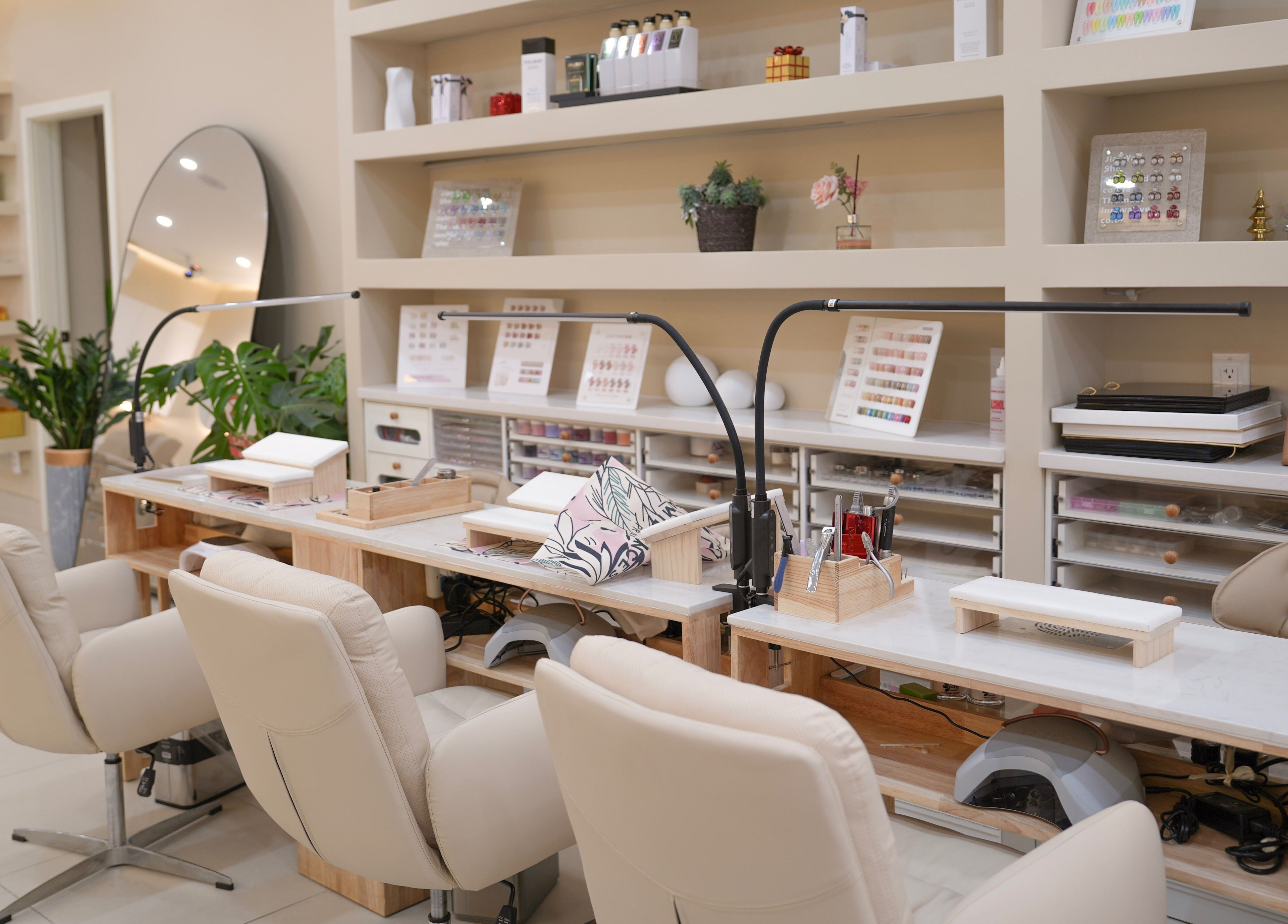 Elegant nail station at H&K Health Beauty in New York, New York, US, showcasing modern design and comfort.