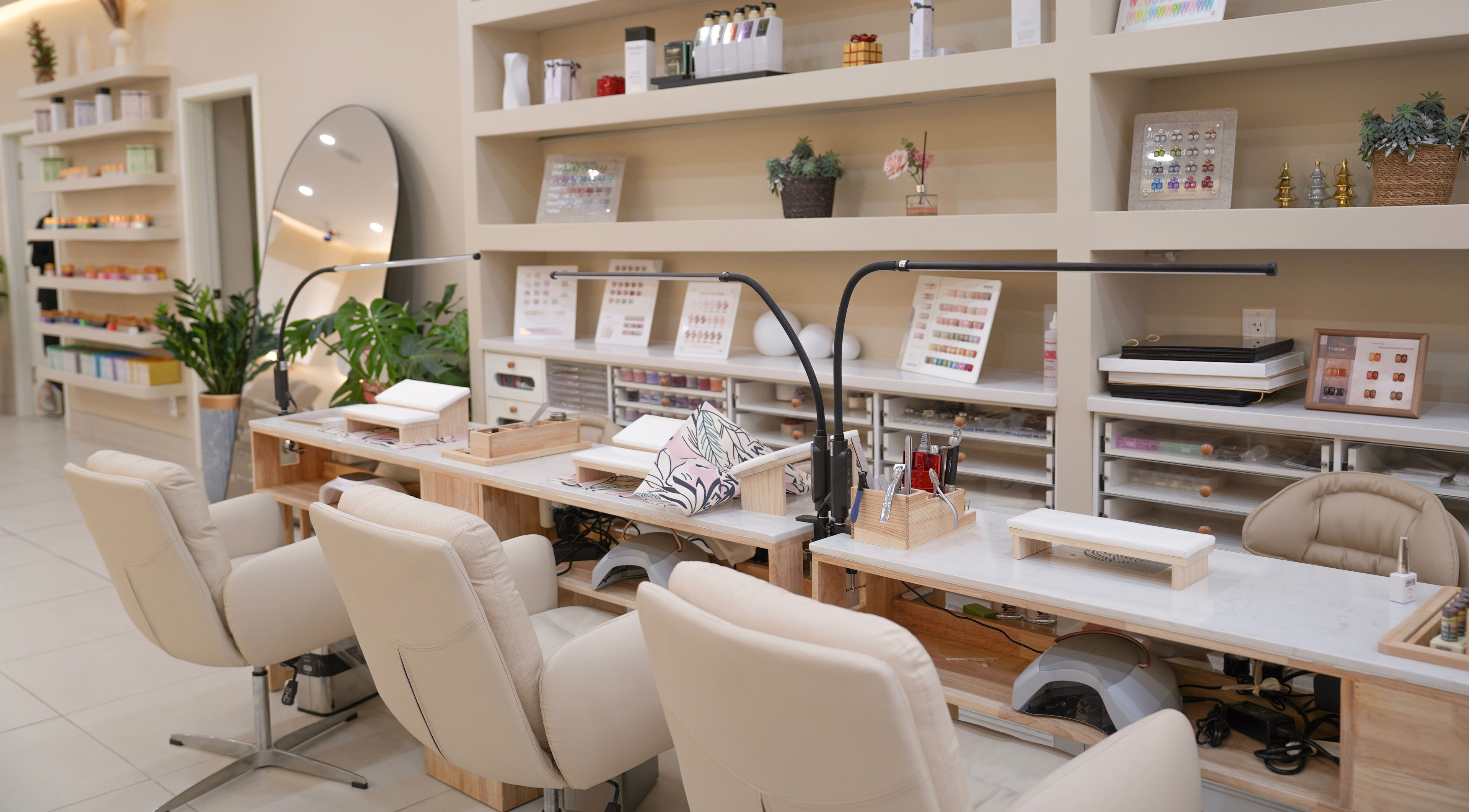 Elegant nail station at H&K Health Beauty in New York, New York, US, showcasing modern design and comfort.