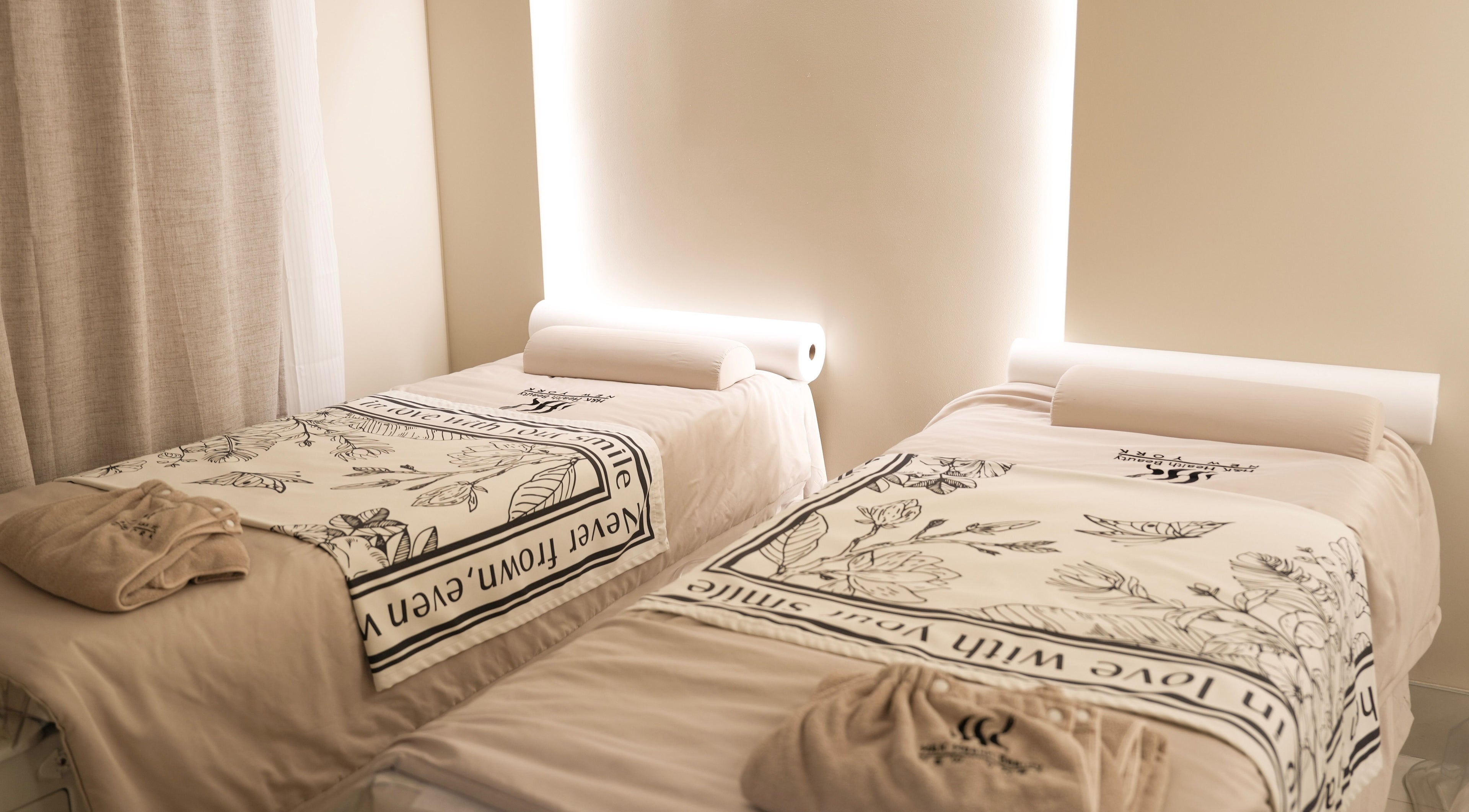 Serene spa beds at H&K Health Beauty in New York, New York, US, offering a relaxing wellness experience.