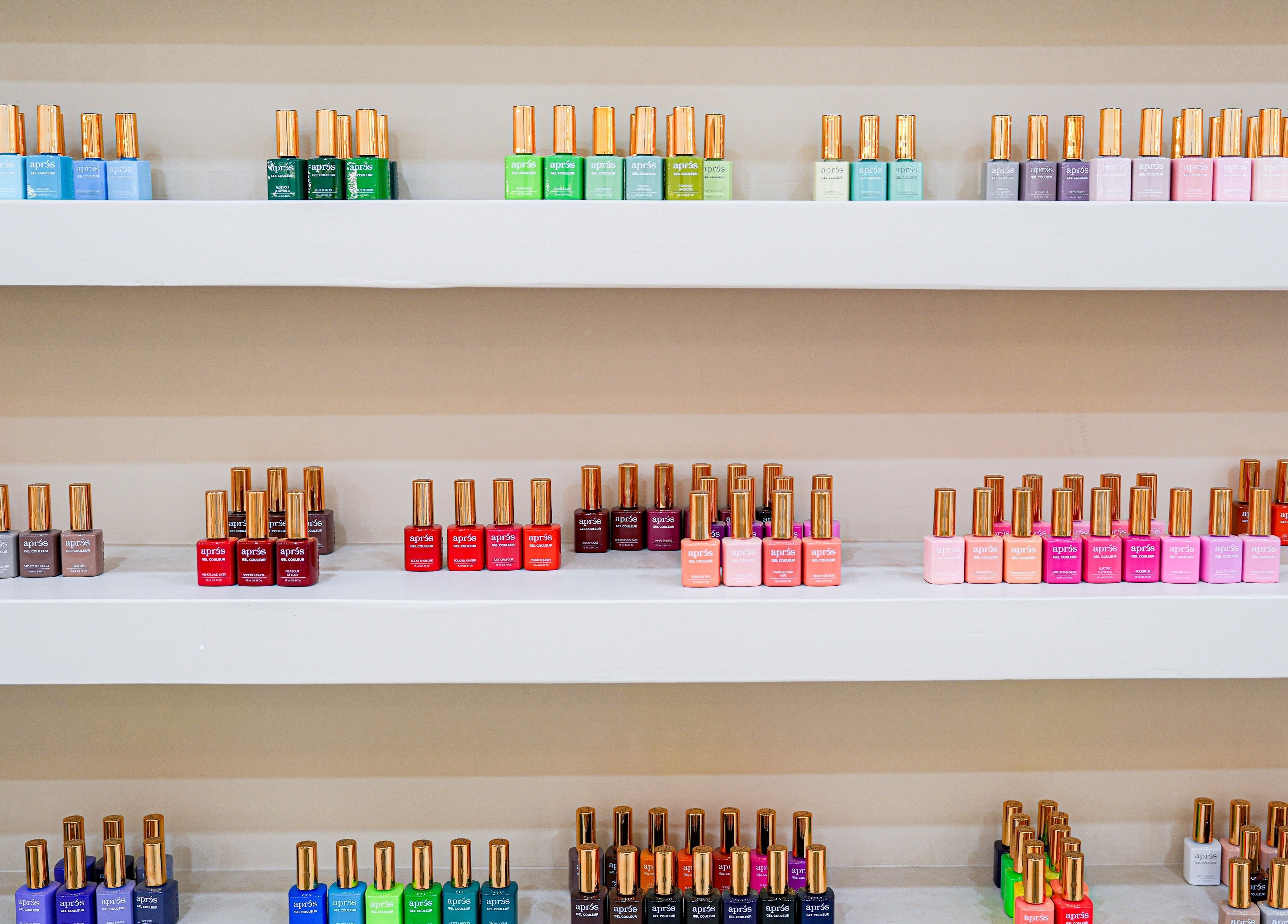 Colorful nail polish display at H&K Health Beauty in New York, New York, US.