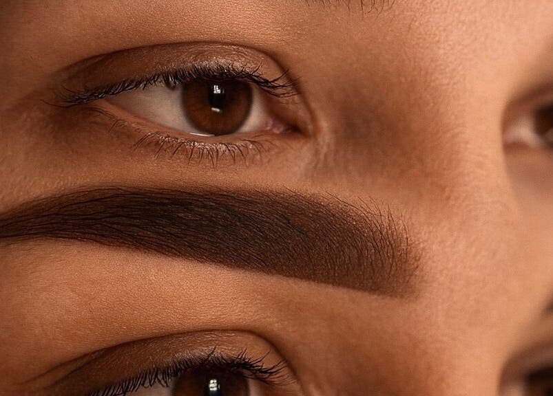 Close-up of expertly shaped brows at EnhancedbyMursal, Toronto, Ontario, CA. Perfect for beauty enthusiasts.