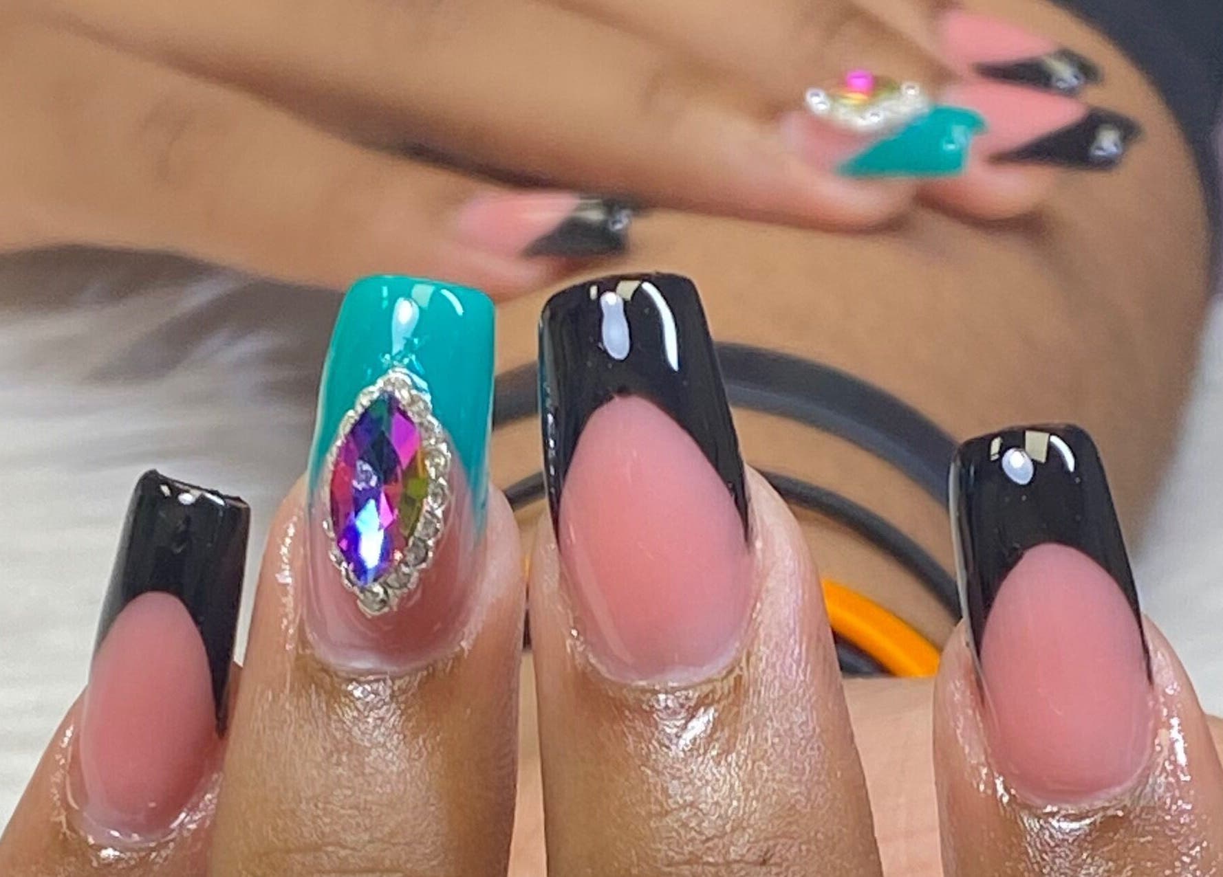 Elegant gemstone-adorned nails at Acacias Nails By JC, Toronto, Ontario, CA, showcase unique artistry and style.