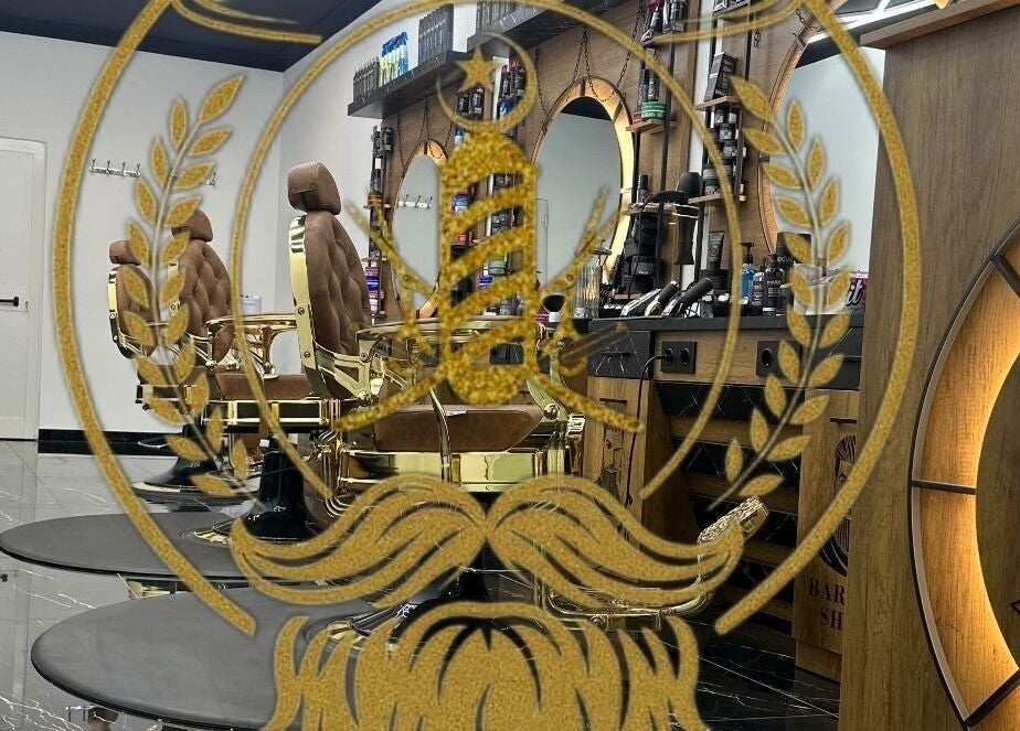 Chic barber chairs at D.S.Newlook, San Ġwann, MT, in a stylish, modern interior.