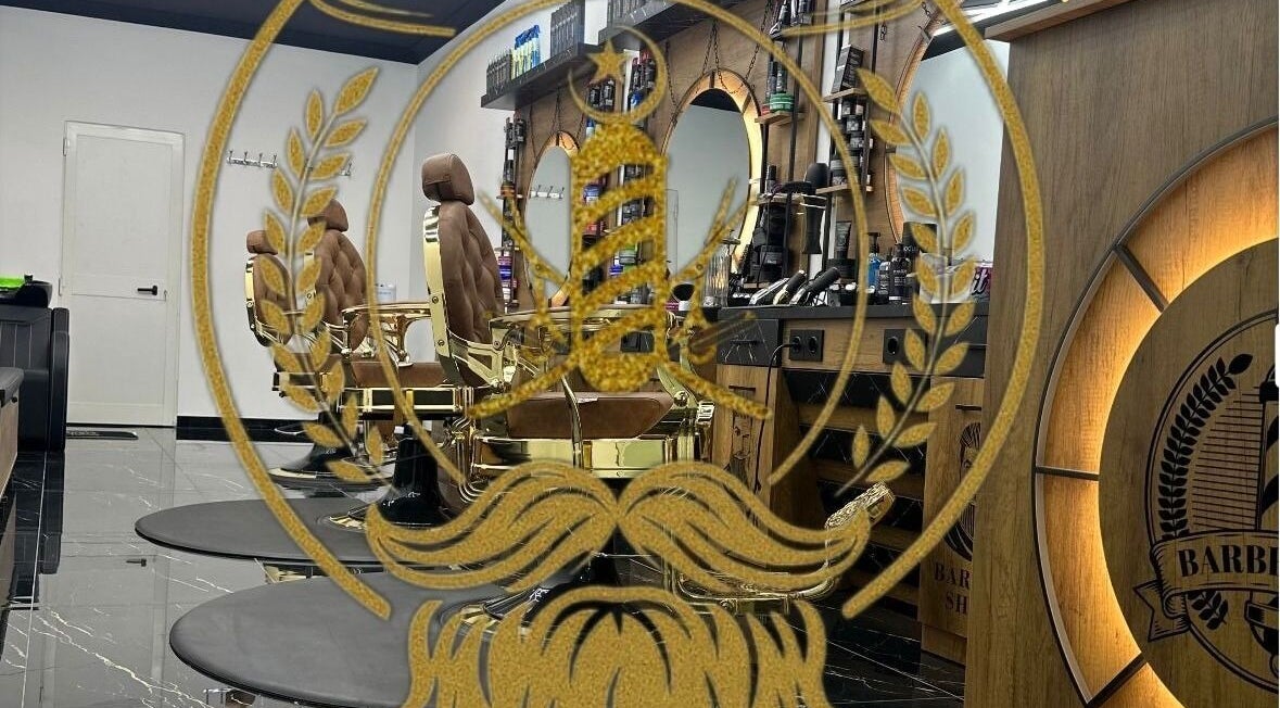 Chic barber chairs at D.S.Newlook, San Ġwann, MT, in a stylish, modern interior.