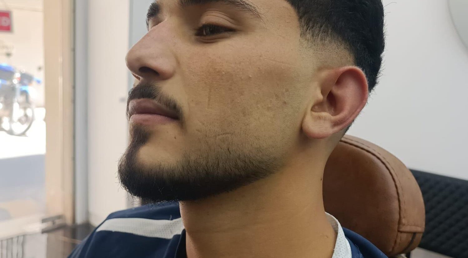 Expert beard styling at D.S.Newlook, San Ġwann, MT showcasing a sharp and clean finish.