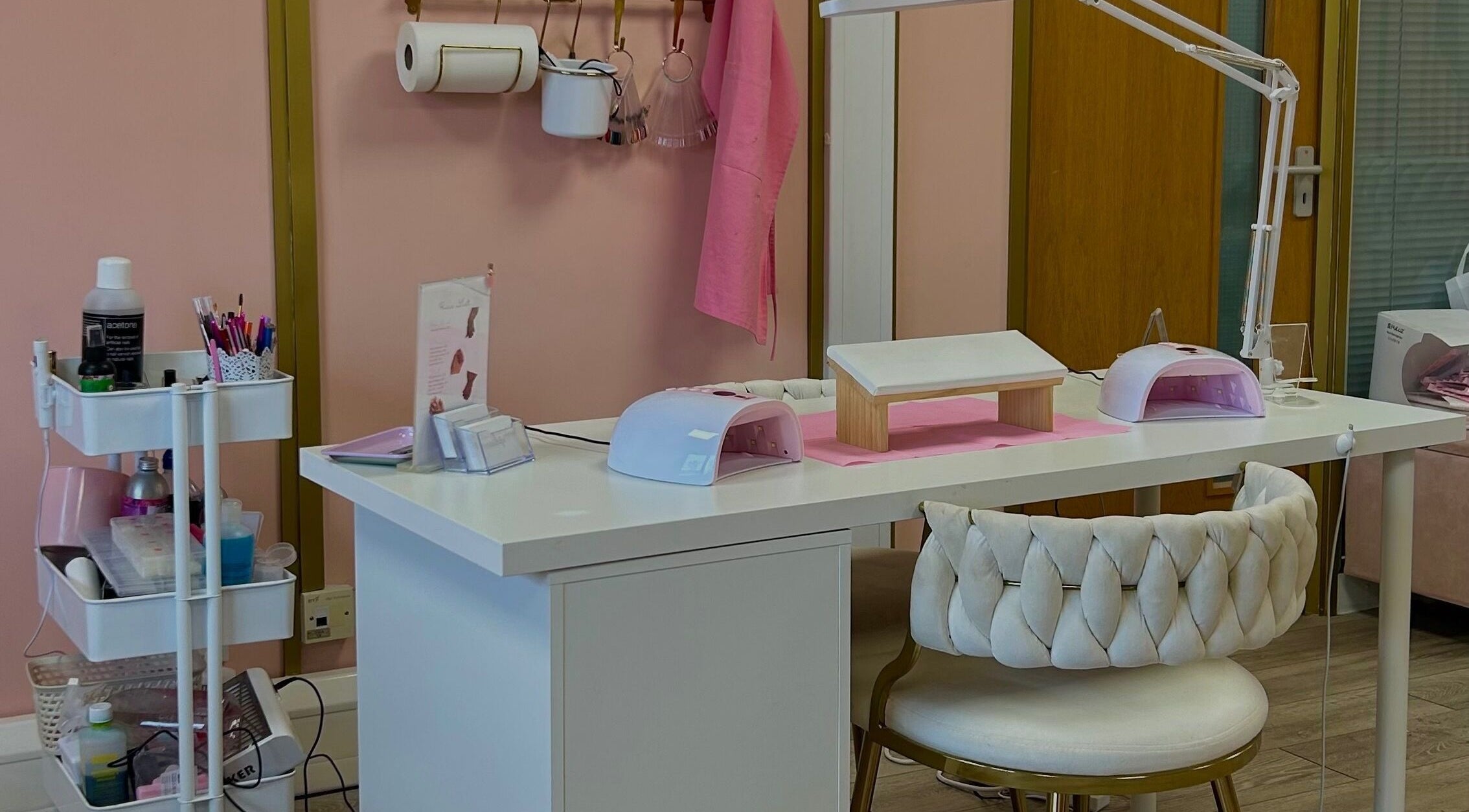Elegant nail station at Triple A Nails, Dumbarton, Scotland, GB with tools and cozy chair.