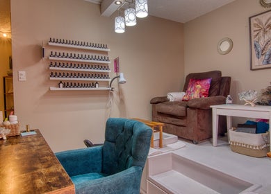 Relaxing nail salon area at 108 Aquarius Spa, Simpson Bay, SX with plush seating and elegant decor.