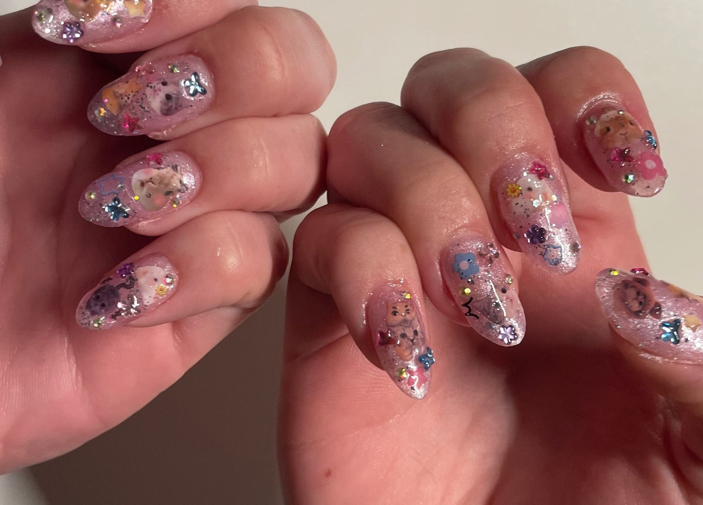 Intricate nail art with sparkles from Candied Clawz in Ashmore, Queensland, AU.