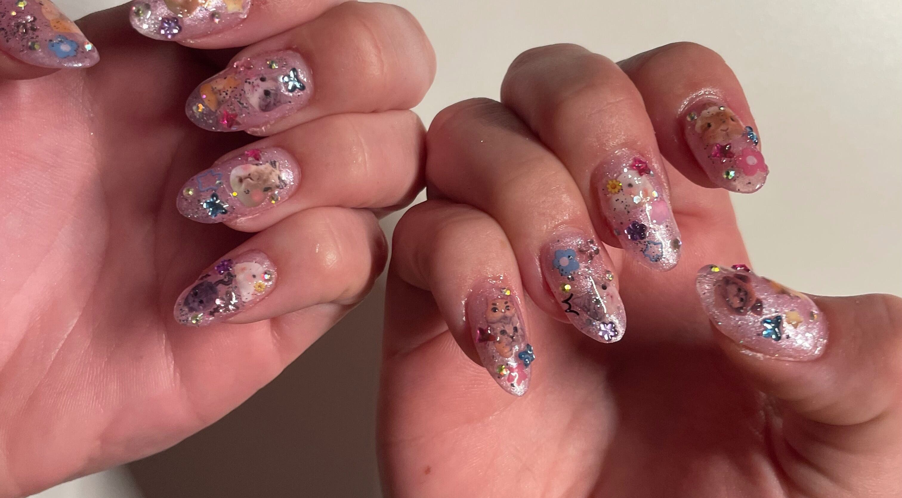 Intricate nail art with sparkles from Candied Clawz in Ashmore, Queensland, AU.