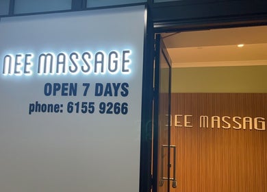 Nee Massage signage illuminated at night, Shenton Park, Western Australia, AU, inviting relaxation and wellness.