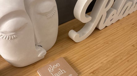 Calming sculpture and Glee Lash card at Koongamia, Western Australia, AU. Elegant decor enhancing the venue's ambiance.