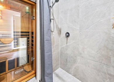 Luxurious sauna and shower at Lueur Clinic, North Willoughby, New South Wales, AU for wellness retreats.
