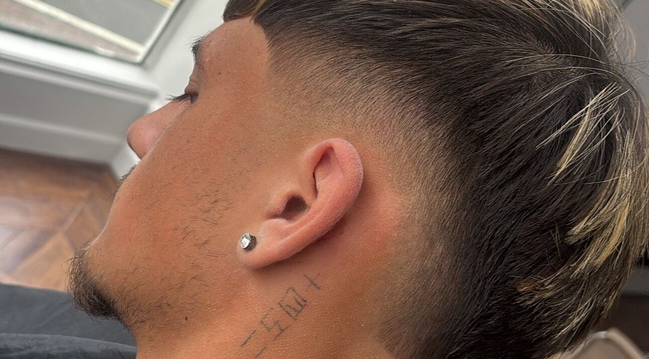 Close-up of trendy fade haircut at H E I G H T S in Dundee, Scotland, GB.