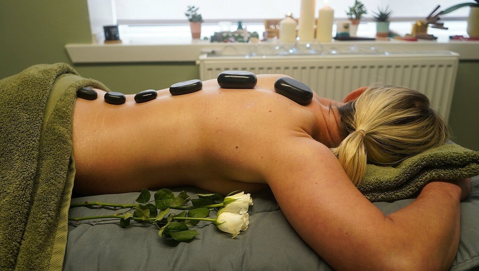Hot stone massage at Holistic Healing by Lorraine, Dumbarton, Scotland, GB. Relaxing wellness experience.