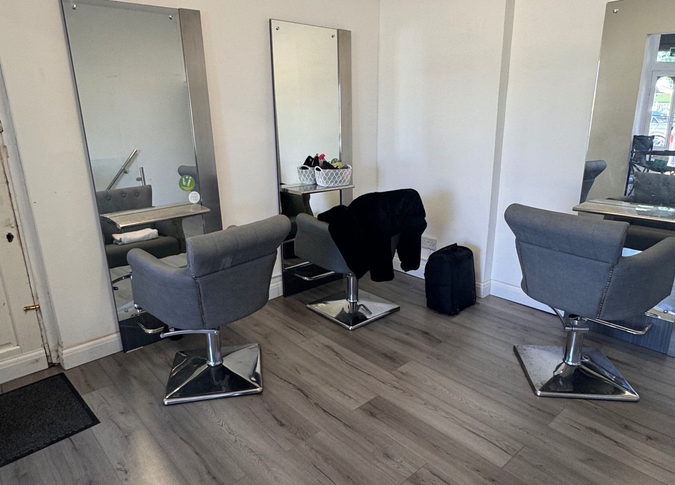 Modern salon interior with chic chairs at TeeBeauty World, Manchester, England, GB.