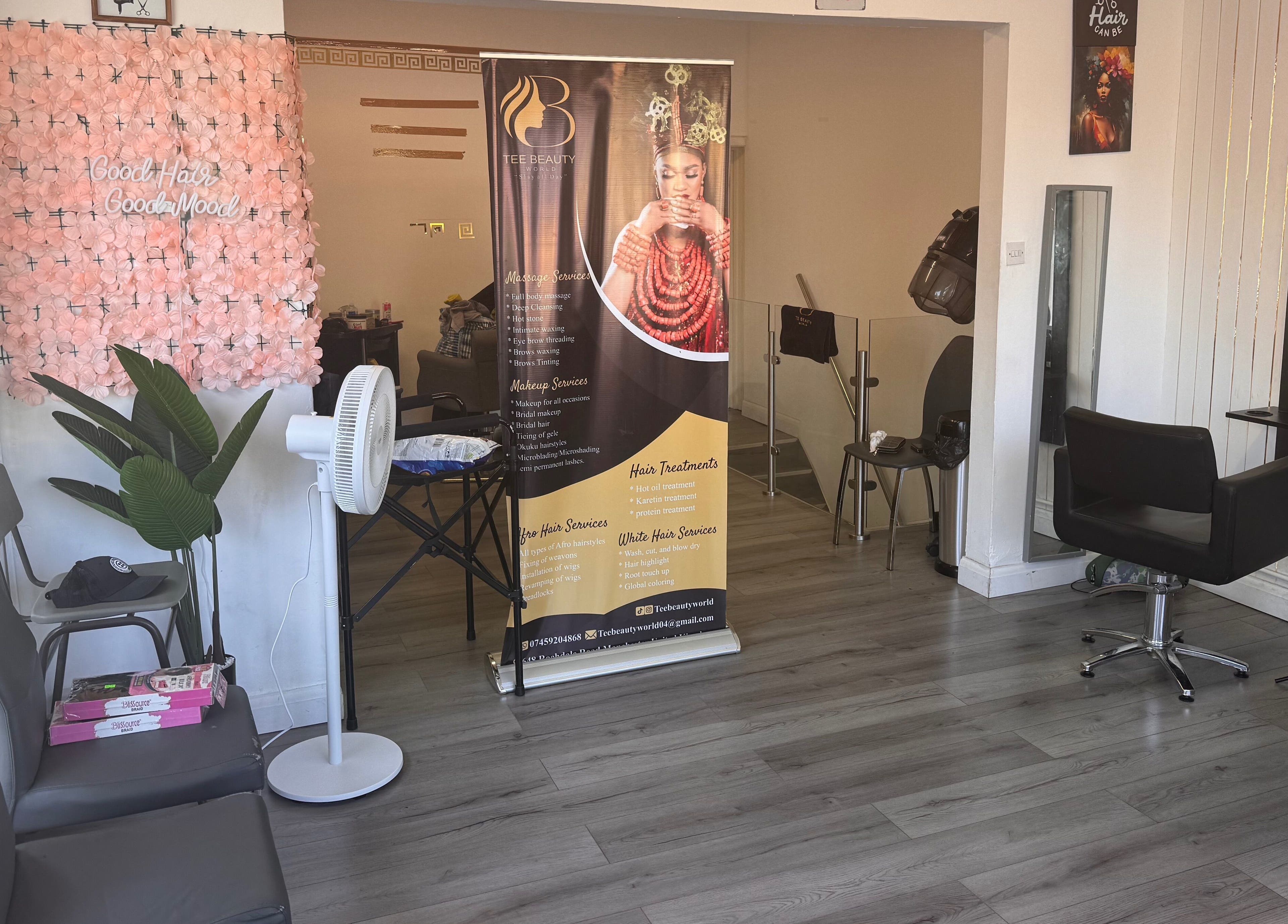 Modern salon interior at TeeBeauty World, showcasing stylish decor and seating in Manchester, England, GB.
