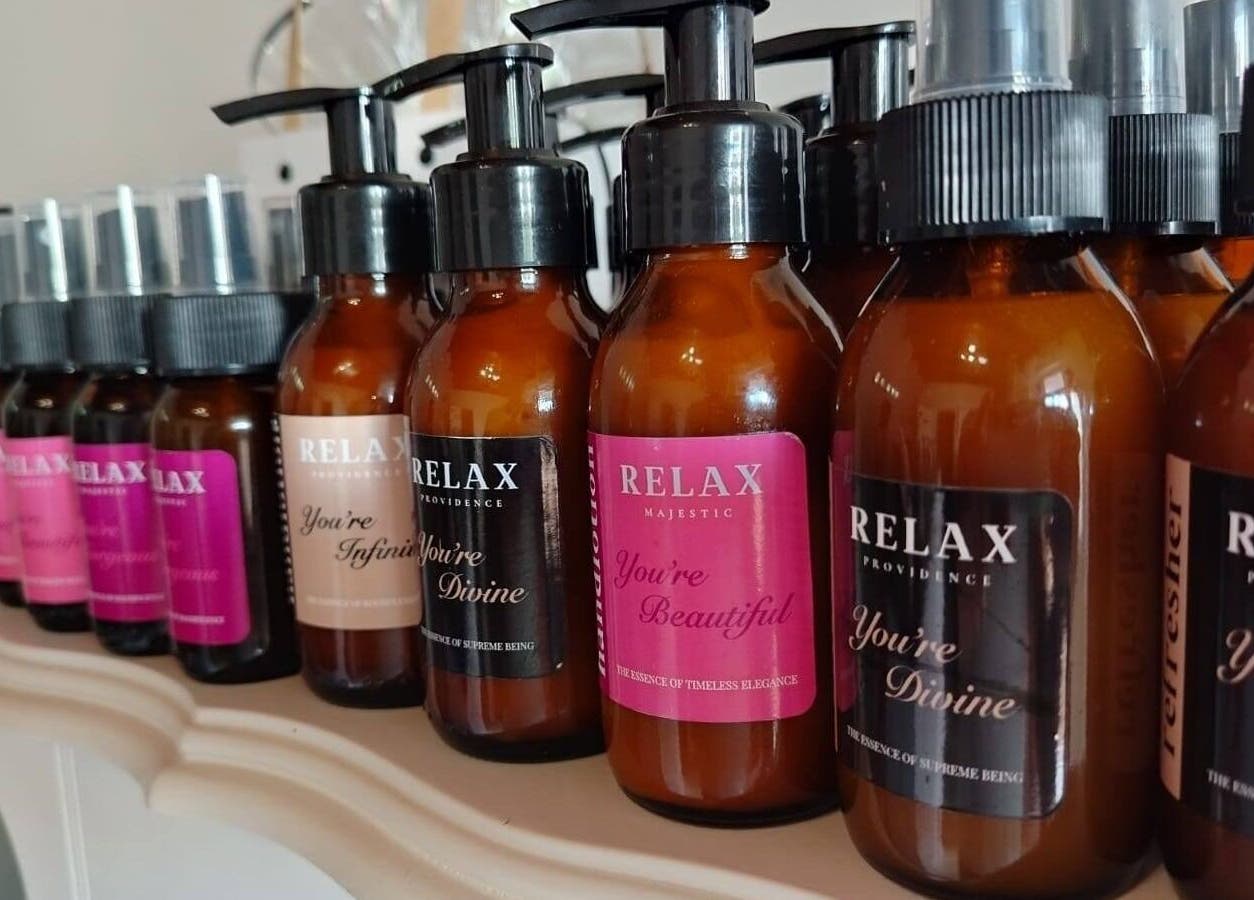 Assorted Relax Greyton Spa products lined up neatly, showcasing premium beauty care at Greyton, Western Cape, ZA.