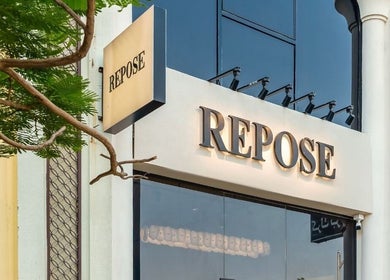 Front view of Repose Ladies Salon L.L.C in Dubai, Dubai, AE showcasing the modern exterior signage.