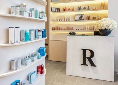 Reception area of Repose Ladies Salon L.L.C, Dubai, Dubai, AE with luxury beauty products on display.
