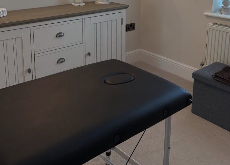 Relaxing treatment room at Naturabelle Aesthetics, Barlow, England, GB, featuring a comfortable massage table.