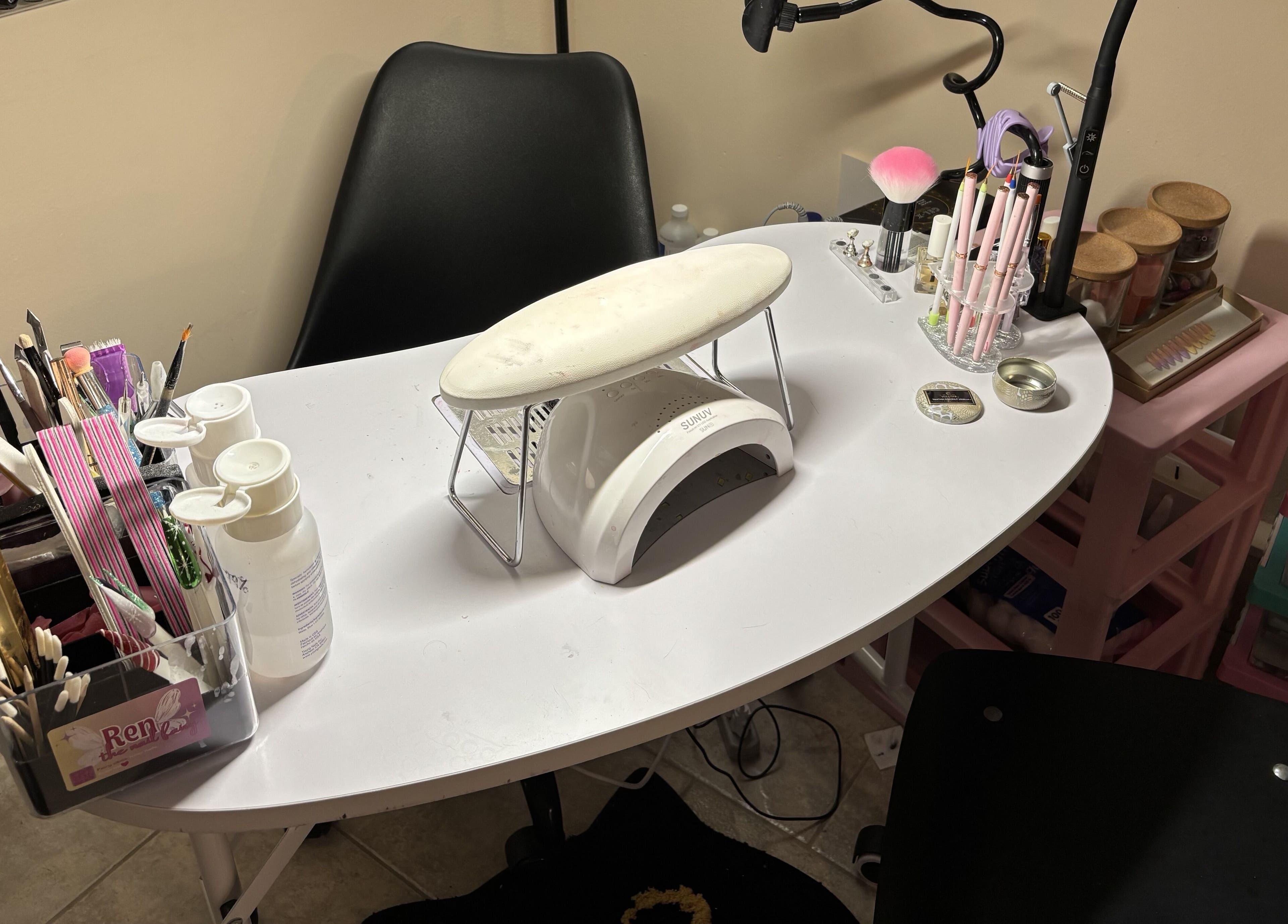 Nail station at Ren The Nail Fairy in Toronto, Ontario, CA, showcasing manicure tools and equipment.