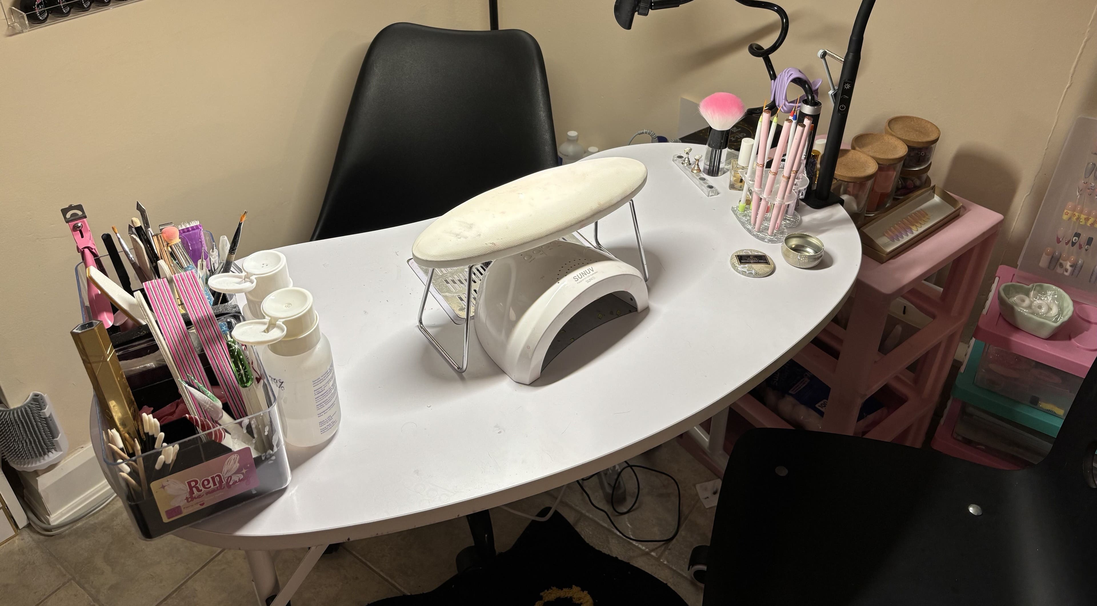 Nail station at Ren The Nail Fairy in Toronto, Ontario, CA, showcasing manicure tools and equipment.