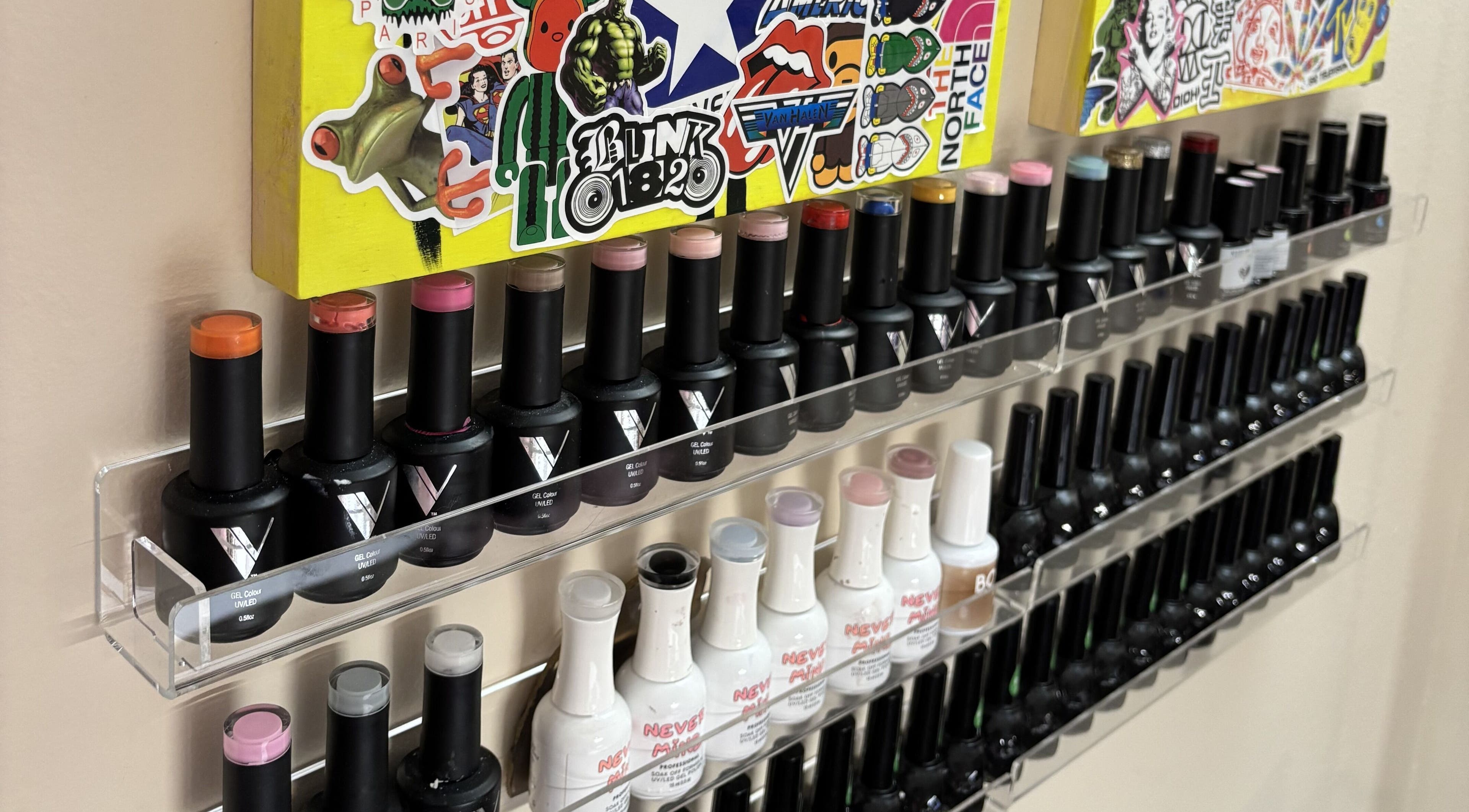Vibrant nail polish collection at Ren The Nail Fairy, Toronto, Ontario, CA, showcasing diverse colors.