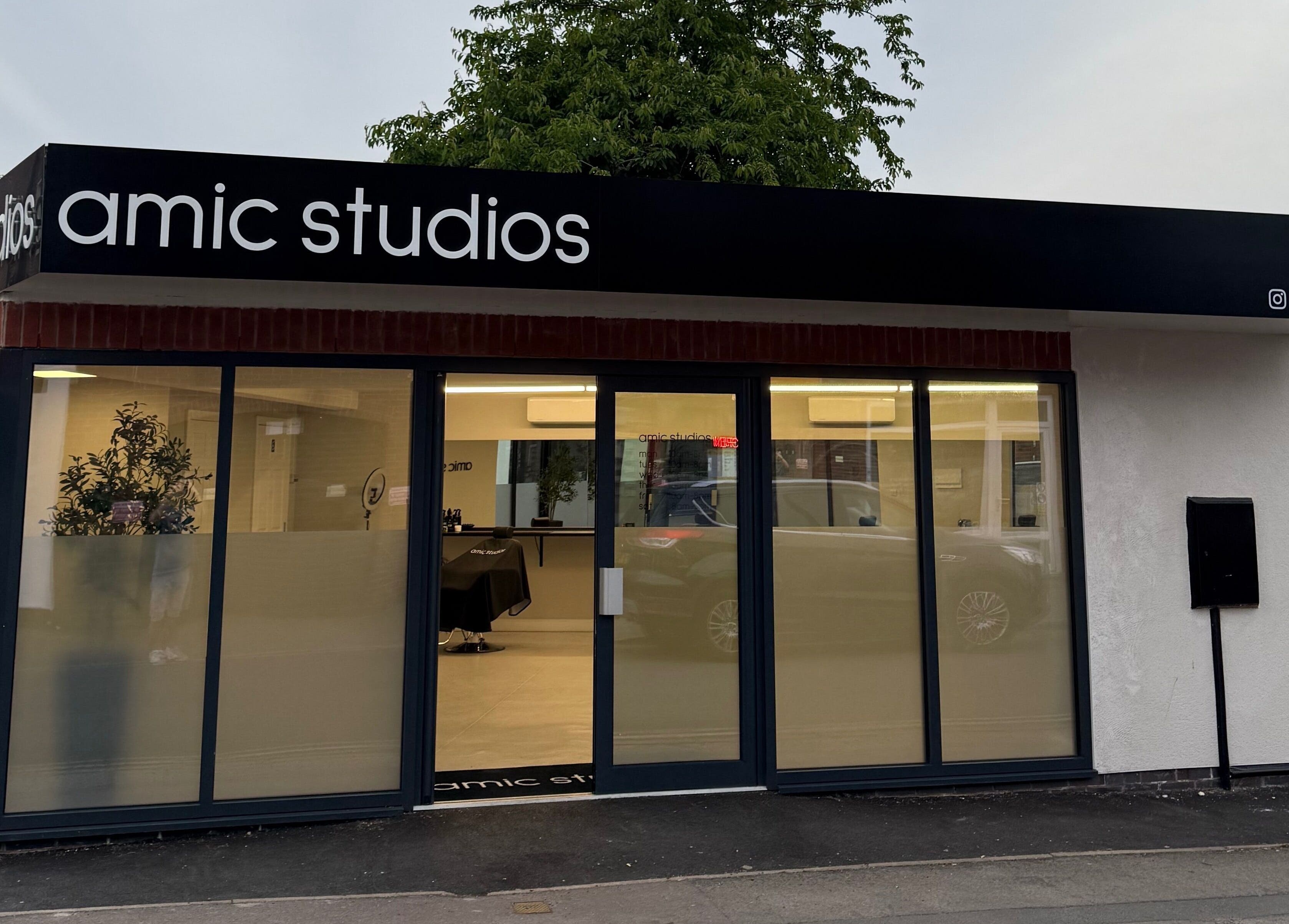 Front view of Amic Studios in Birstall, England, GB, showcasing the sleek modern exterior design.