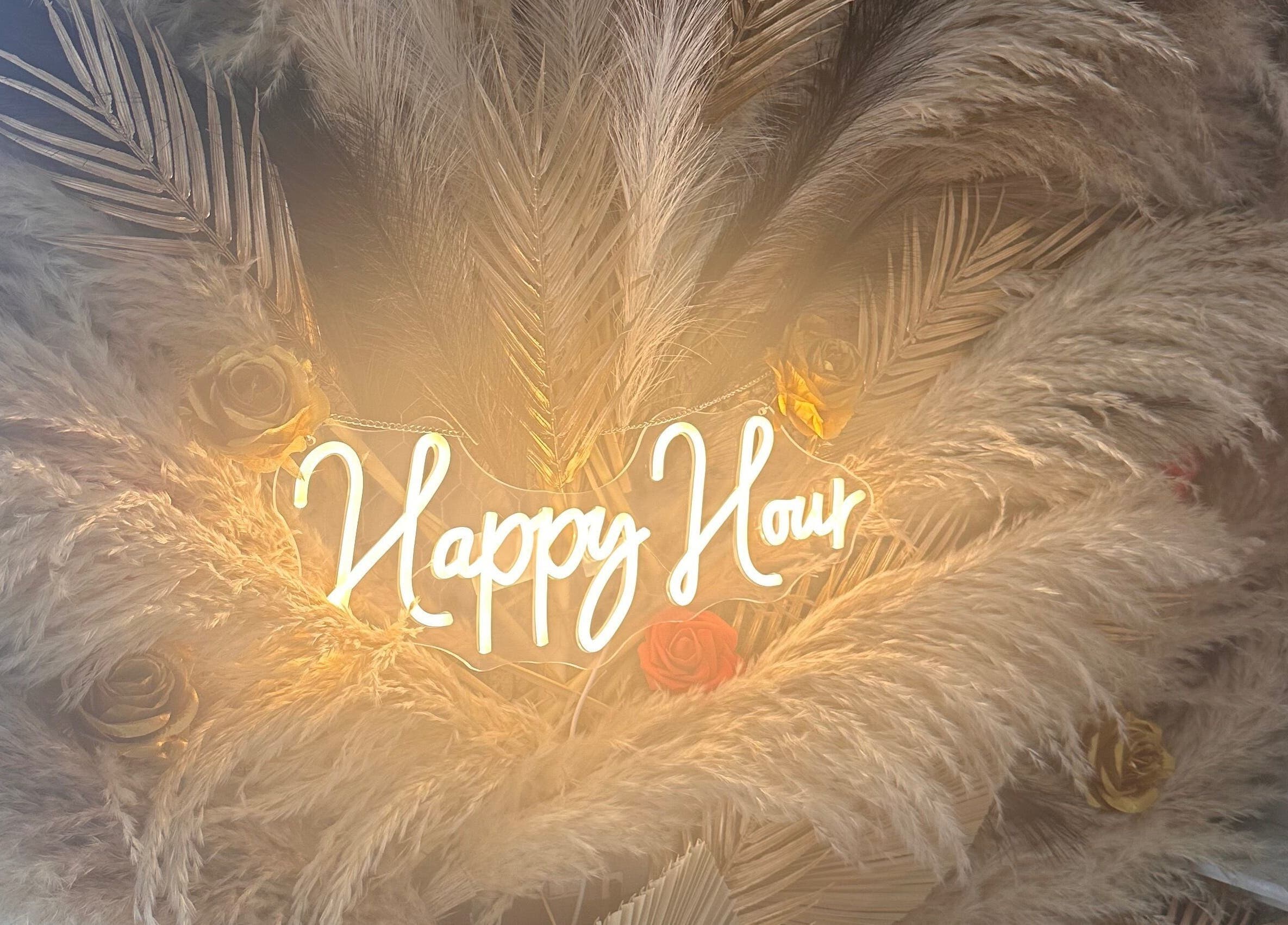 Elegant pampas and roses with 'Happy Hour' sign at The Beauty Bar by Chloe, Kirkcaldy, Scotland, GB.