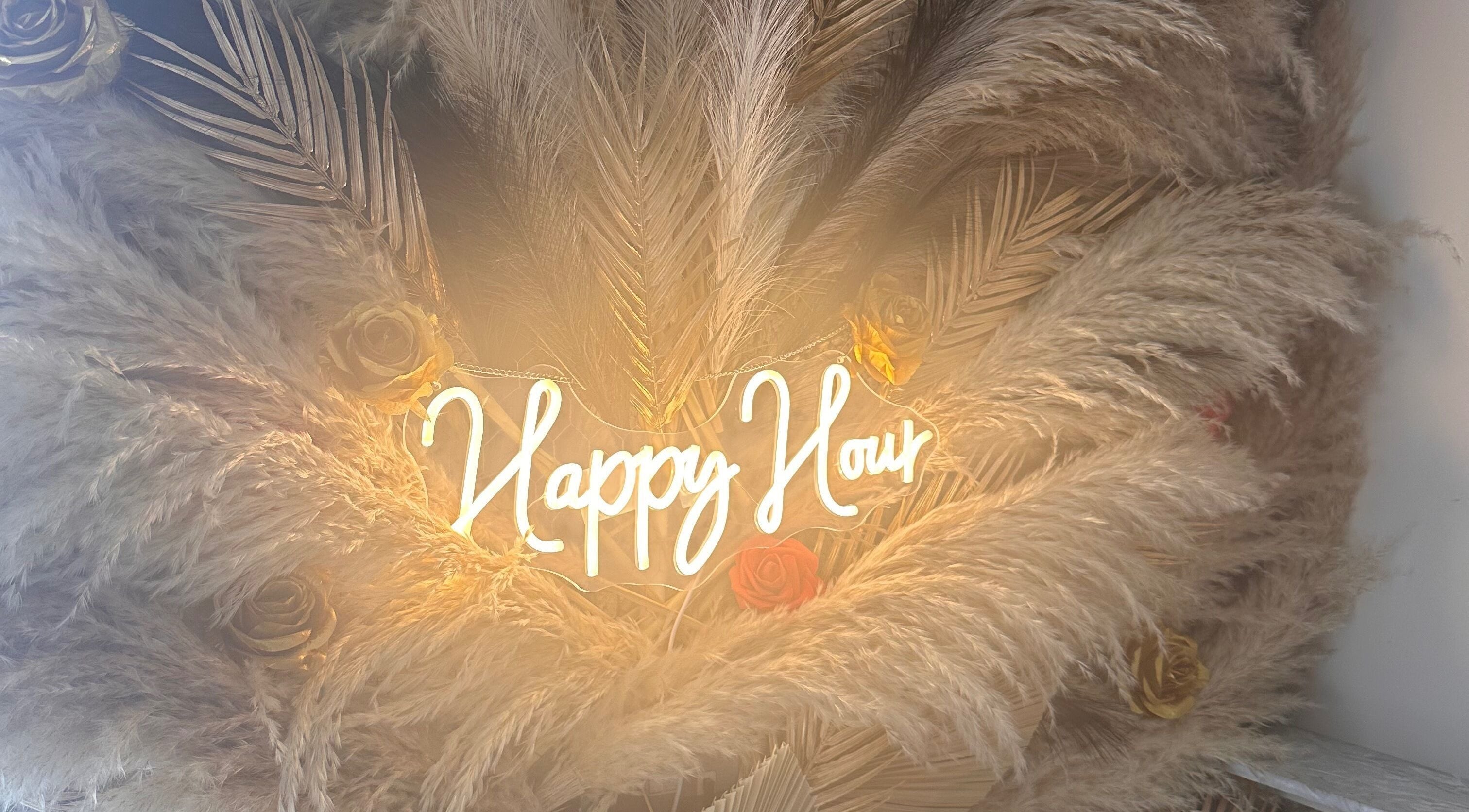 Elegant pampas and roses with 'Happy Hour' sign at The Beauty Bar by Chloe, Kirkcaldy, Scotland, GB.