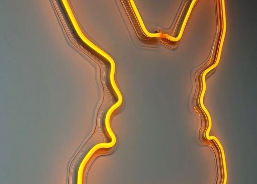 Neon bunny silhouette at Handsome Jacks Whitley Bay, Whitley Bay, England, GB. Bright and captivating decor.
